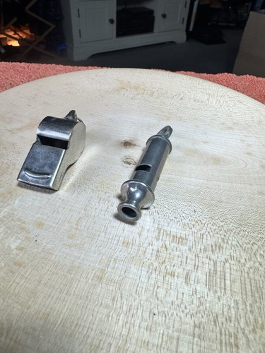Pair whistles - of,